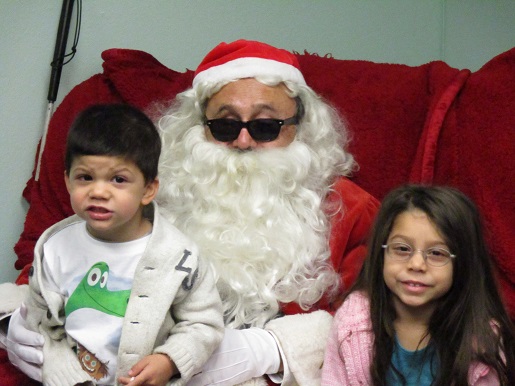 Blind Santa and two children